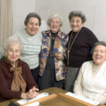 senior woman at the game table